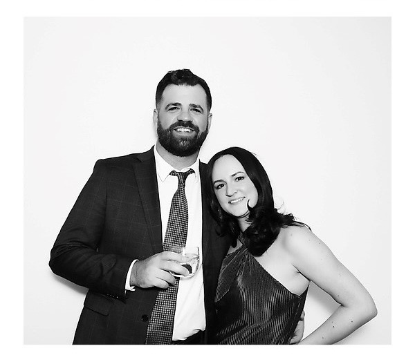 Ashley and her fiancé stood smiling