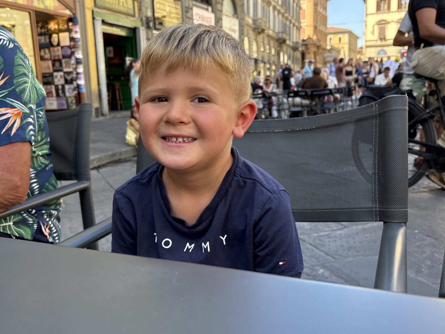 Young boy smiling at the camera
