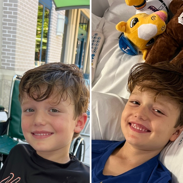 A boy smiles at the camera while in hospital