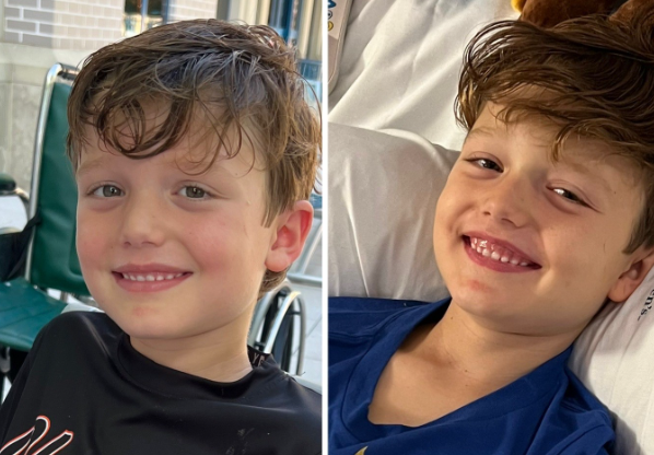 A boy smiles at the camera while in hospital